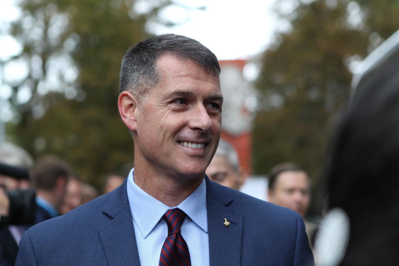 At the Gagarin Cosmonaut Training Center in Star City, Russia, Expedition 49 crewmember Shane Kimbrough of NASA flashes a smile Sept. 8 as he prepares to board a bus that took him and Sergey Ryzhikov and Andrey Borisenko of Roscosmos to nearby Chkalovsky Airfield and a flight to the launch site at the Baikonur Cosmodrome in Kazakhstan, where they will launch on Sept. 24, Kazakh time on the Soyuz MS-02 spacecraft for a five-month mission on the International Space Station.  NASA/Stephanie Stoll 