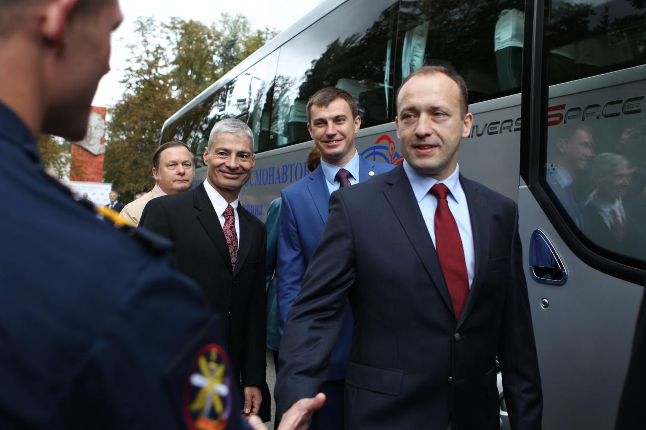 At the Gagarin Cosmonaut Training Center in Star City, Russia, Expedition 49 backup crewmembers Alexander Misurkin (far right) and Nikolai Tikhonov (second from right) of Roscosmos and Mark Vande Hei of NASA (third from right) say goodbye to well-wishers Sept. 8 before boarding busses that took them and prime crewmembers Shane Kimbrough of NASA and Andrey Borisenko and Sergey Ryzhikov of Roscosmos to nearby Chkalovsky Airfield and a flight to the launch site at the Baikonur Cosmodrome in Kazakhstan. Kimbrough, Ryzhikov and Borisenko will launch on Sept. 24, Kazakh time on the Soyuz MS-02 spacecraft for a five-month mission on the International Space Station.  NASA/Stephanie Stoll 