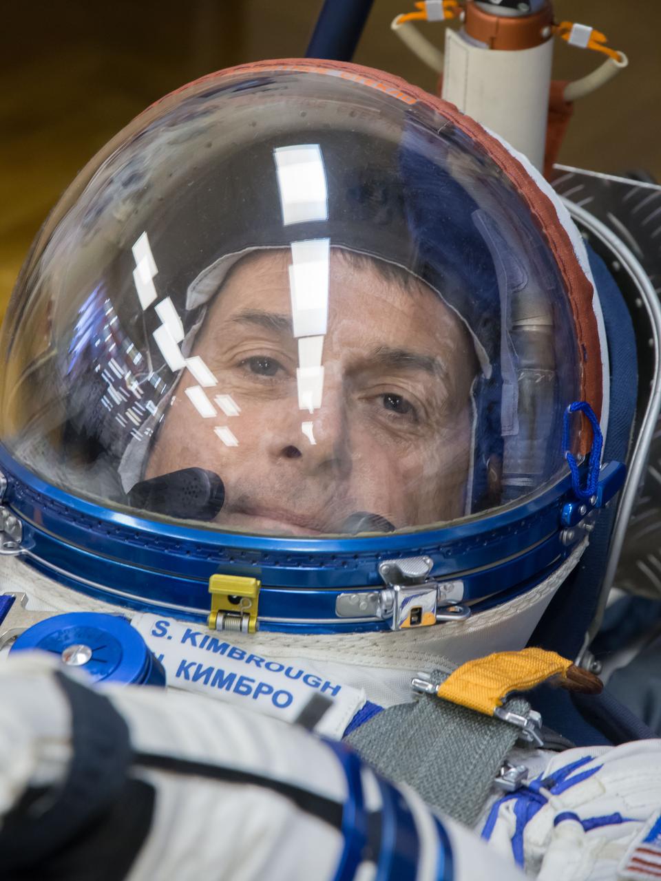 At the Integration Facility at the Baikonur Cosmodrome in Kazakhstan, Expedition 49 crewmember Shane Kimbrough of NASA undergoes a pressure test on his Sokol launch and entry suit Sept. 9 during a pre-launch training fit check. Kimbrough and Sergey Ryzhikov and Andrey Borisenko of Roscosmos will launch Sept. 24, Kazakh time on the Soyuz MS-02 vehicle for a five-month mission on the International Space Station.  NASA/Victor Zelentsov 