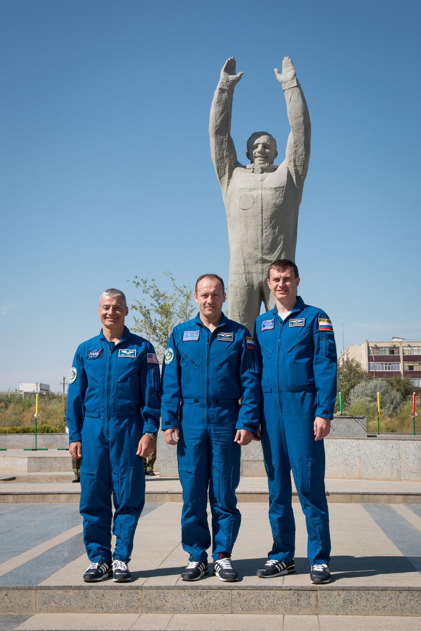 The Expedition 49 backup crewmembers pose for pictures Sept. 10 in front of a statue of Yuri Gagarin, the first human to fly in space, during a tour of the city of Baikonur, Kazakhstan. They are serving as backups to Shane Kimbrough of NASA and Sergey Ryzhikov and Andrey Borisenko of Roscosmos, who will launch on Sept. 24, Kazakh time from the Baikonur Cosmodrome in Kazakhstan on the Soyuz MS-02 vehicle for a five-month mission on the International Space Station. NASA/Victor Zelentsov