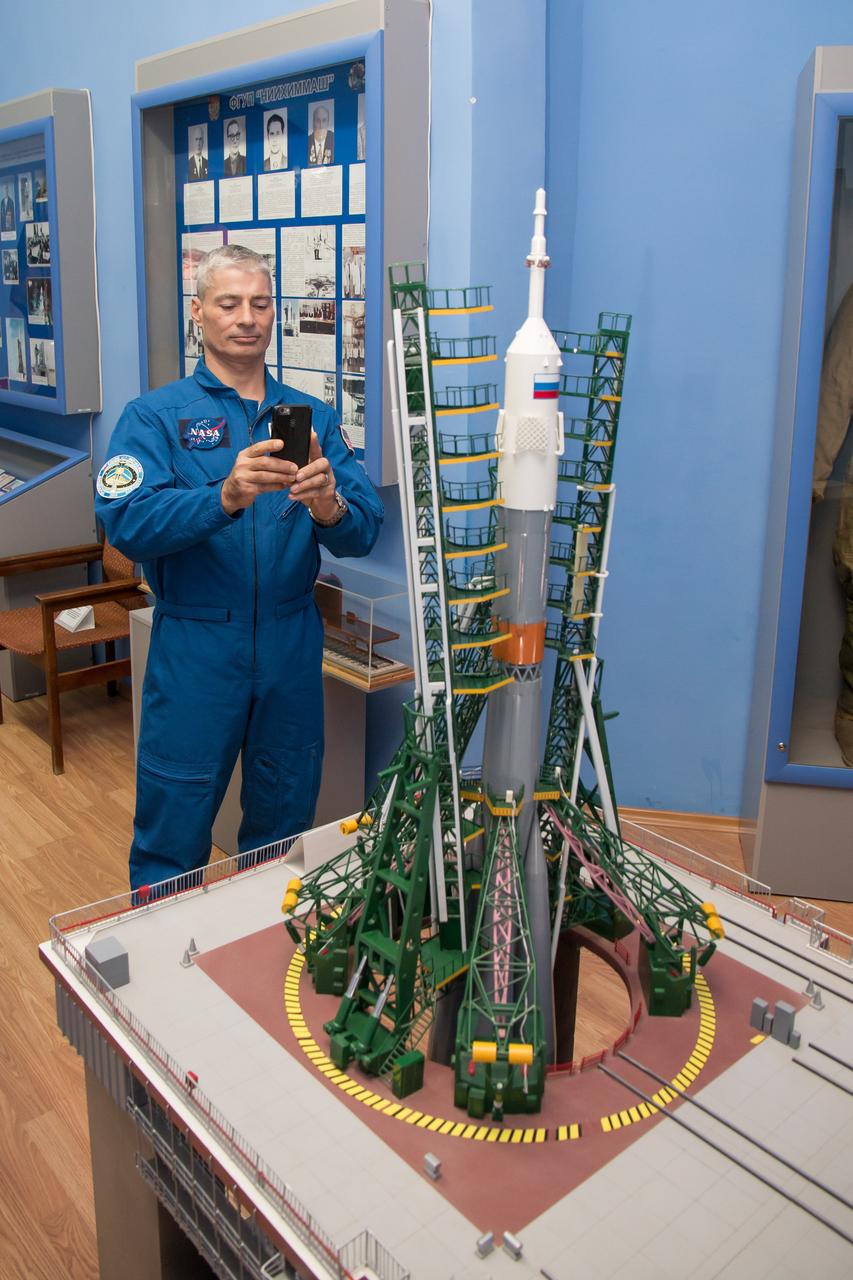 Expedition 49 backup crewmember Mark Vande Hei of NASA takes a photo of a model of a Soyuz rocket on its launch pad in a local museum Sept. 10 during a tour of the city of Baikonur, Kazakhstan. Vande Hei and two Russian cosmonauts from Roscosmos are serving as backups to Shane Kimbrough of NASA and Sergey Ryzhikov and Andrey Borisenko of Roscosmos, who will launch on Sept. 24, Kazakh time from the Baikonur Cosmodrome in Kazakhstan on the Soyuz MS-02 vehicle for a five-month mission on the International Space Station. NASA/Victor Zelentsov