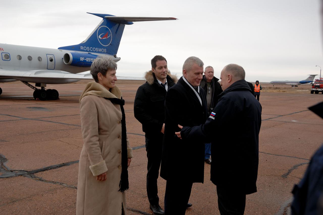 At the launch site in Baikonur, Kazakhstan, Expedition 50-51 crewmember Oleg Novitskiy of the Russian Federal Space Agency (Roscosmos) is greeted by a Russian space official upon the crew’s arrival Nov. 1 following a flight from their training base in Star City, Russia. On the left is NASA’s Peggy Whitson and behind Novitskiy is Thomas Pesquet of the European Space Agency. The three crewmembers will launch Nov. 18, Baikonur time, on the Soyuz MS-03 spacecraft for a six-month mission on the International Space Station. NASA/Alexander Vysotsky