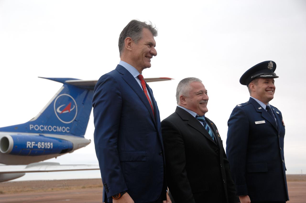 At the launch site in Baikonur, Kazakhstan, Expedition 50-51 backup crewmembers Paolo Nespoli of the European Space Agency (left), Fyodor Yurchikhin of the Russian Federal Space Agency (Roscosmos, center) and Jack Fischer of NASA (right) smile as they are greeted Nov. 1 upon their arrival following a flight from their training base in Star City, Russia. They are the backups to Peggy Whitson of NASA, Oleg Novitskiy of the Russian Federal Space Agency (Roscosmos) and Thomas Pesquet of the European Space Agency, who will launch Nov. 18, Baikonur time, on the Soyuz MS-03 spacecraft for a six-month mission on the International Space Station. NASA/Alexander Vysotsky