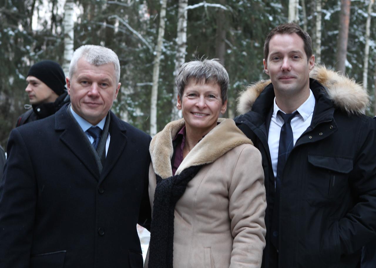 At the Gagarin Cosmonaut Training Center in Star City, Russia, Expedition 50-51 crewmembers Oleg Novitskiy of the Russian Federal Space Agency (Roscosmos, left), Peggy Whitson of NASA (center) and Thomas Pesquet of the European Space Agency (right) pose for pictures Nov. 1 before flying to their launch site in Baikonur, Kazakhstan. The trio will launch Nov. 18, Baikonur time, on the Soyuz MS-03 spacecraft for a six-month mission on the International Space Station. NASA/Stephanie Stoll