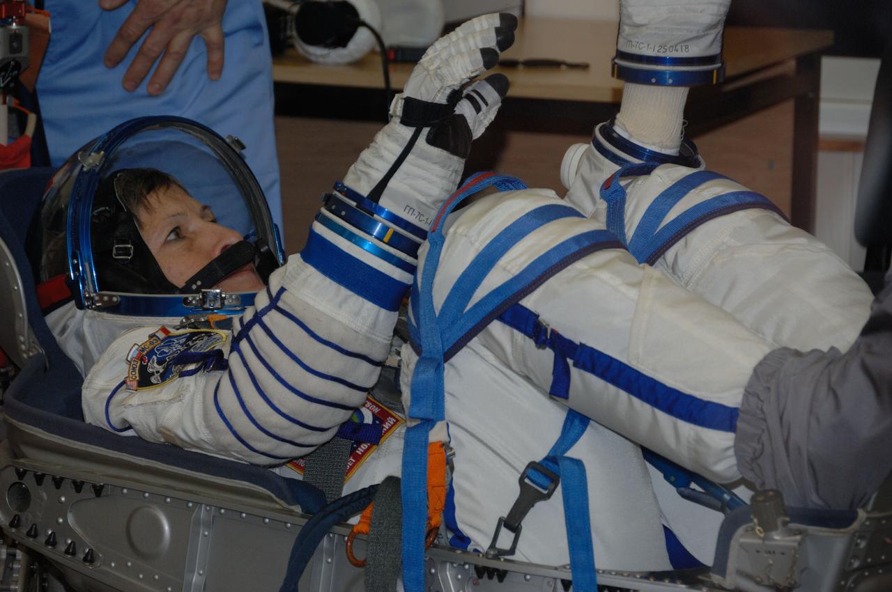In the Integration Facility at the Baikonur Cosmodrome in Kazakhstan, Expedition 50-51 crewmember Peggy Whitson of NASA undergoes a pressure test of her Sokol launch and entry suit Nov. 2 during a fit check dress rehearsal. Whitson, Oleg Novitskiy of the Russian Federal Space Agency (Roscosmos) and Thomas Pesquet of the European Space Agency will launch Nov. 18, Baikonur time, on the Soyuz MS-03 spacecraft for a six-month mission on the International Space Station. NASA/Alexander Vysotsky
