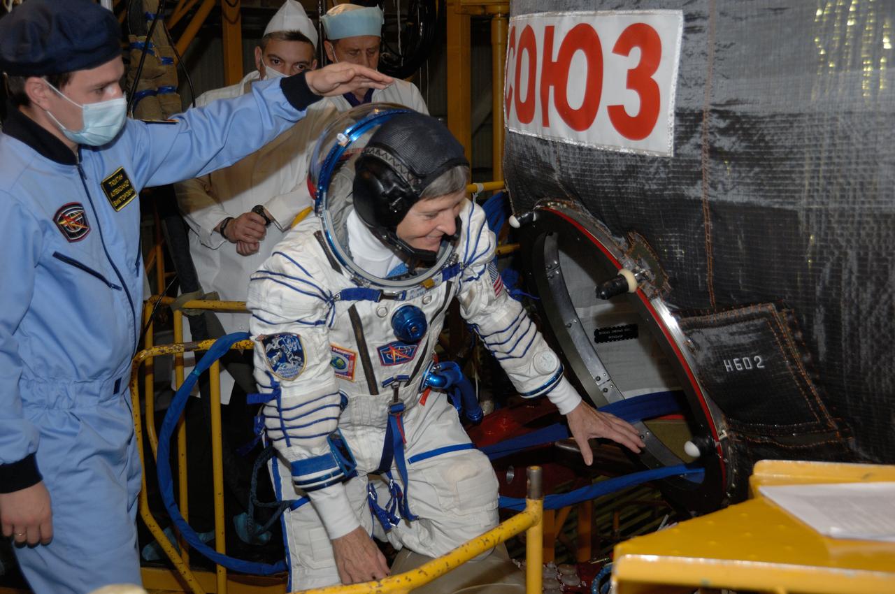 In the Integration Facility at the Baikonur Cosmodrome in Kazakhstan, Expedition 50-51 crewmember Peggy Whitson of NASA boards the Soyuz MS-03 spacecraft Nov. 2 during a fit check dress rehearsal. Whitson, Oleg Novitskiy of the Russian Federal Space Agency (Roscosmos) and Thomas Pesquet of the European Space Agency will launch Nov. 18, Baikonur time, for a six-month mission on the International Space Station. NASA/Alexander Vysotsky