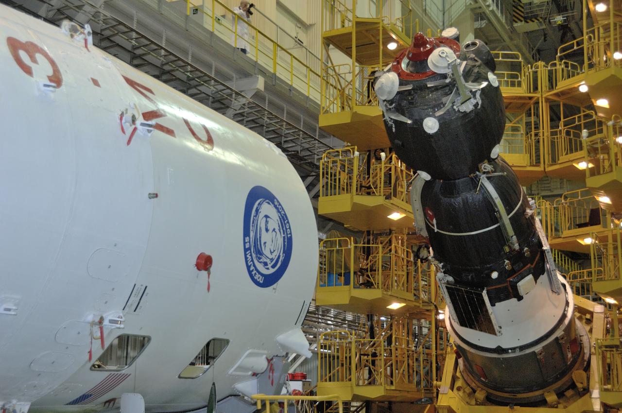 In the Integration Facility at the Baikonur Cosmodrome in Kazakhstan, the Soyuz MS-03 spacecraft begins its rotation into position for its encapsulation into the upper stage of its Soyuz booster Nov. 9. Expedition 50-51 crewmembers Peggy Whitson of NASA, Oleg Novitskiy of the Russian Federal Space Agency (Roscosmos) and Thomas Pesquet of the European Space Agency will launch on the Soyuz Nov. 18, Baikonur time, for a six-month mission on the International Space Station. NASA/Alexander Vysotsky
