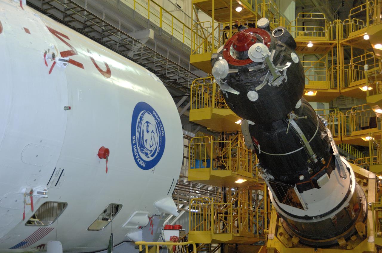 In the Integration Facility at the Baikonur Cosmodrome in Kazakhstan, the Soyuz MS-03 spacecraft begins its rotation into position for its encapsulation into the upper stage of its Soyuz booster Nov. 9. Expedition 50-51 crewmembers Peggy Whitson of NASA, Oleg Novitskiy of the Russian Federal Space Agency (Roscosmos) and Thomas Pesquet of the European Space Agency will launch on the Soyuz Nov. 18, Baikonur time, for a six-month mission on the International Space Station. NASA/Alexander Vysotsky
