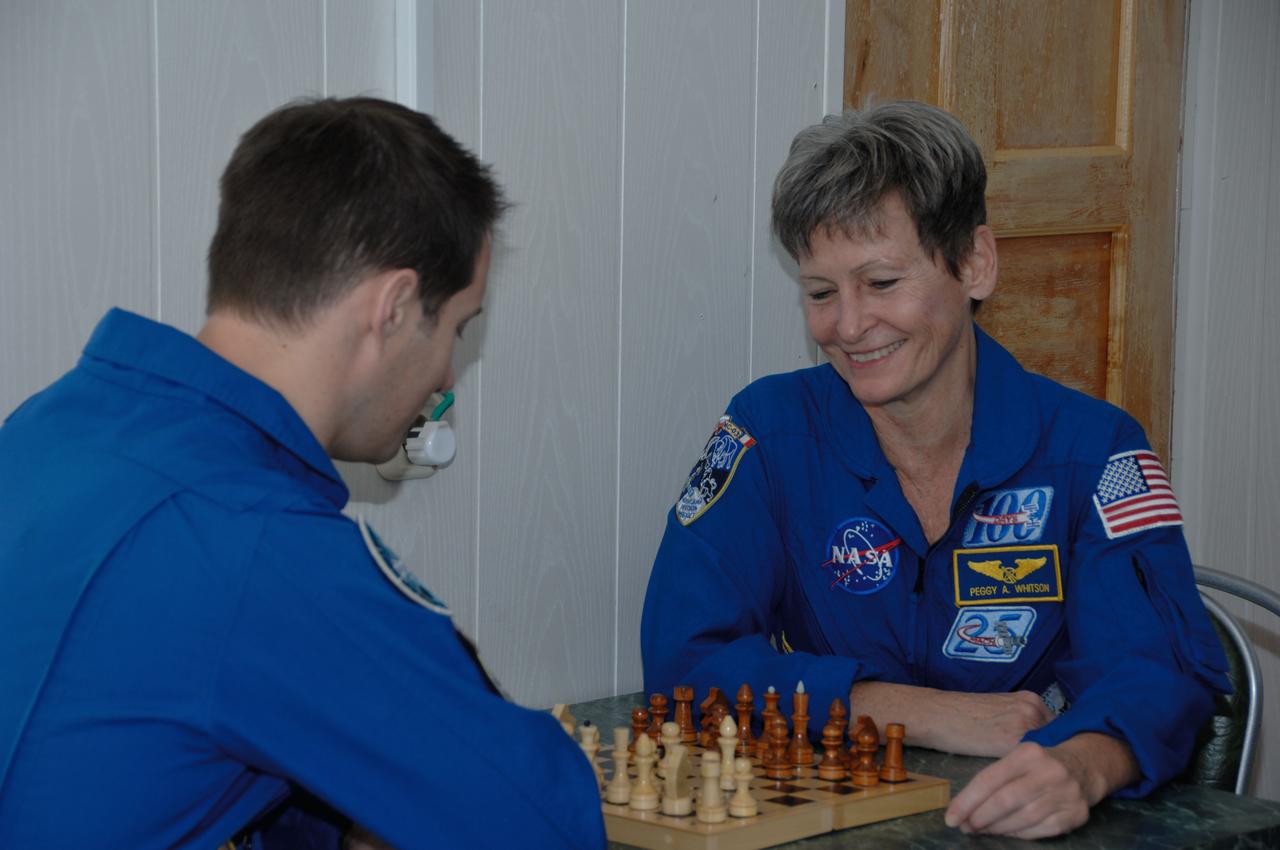 At their Cosmonaut Hotel crew quarters in Baikonur, Kazakhstan, Expedition 50-51 crewmembers Thomas Pesquet of the European Space Agency (left) and Peggy Whitson of NASA (right) try their hand at a game of chess Nov. 10 as part of their preflight activities. Pesquet, Whitson and Oleg Novitskiy of the Russian Federal Space Agency (Roscosmos) will launch Nov. 18, Baikonur time, on the Soyuz MS-03 spacecraft for a six-month mission on the International Space Station. NASA/Alexander Vysotsky