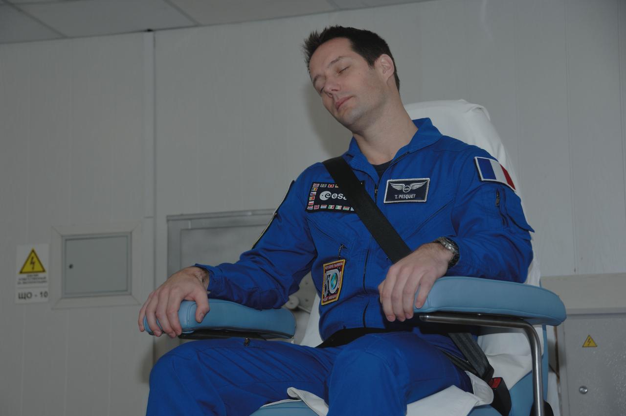 At his Cosmonaut Hotel crew quarters in Baikonur, Kazakhstan, Expedition 50-51 crewmember Thomas Pesquet of the European Space Agency takes a spin in a rotating chair Nov. 10 to test his vestibular system as part of preflight activities. Pesquet, Peggy Whitson of NASA and Oleg Novitskiy of the Russian Federal Space Agency (Roscosmos) will launch Nov. 18, Baikonur time, on the Soyuz MS-03 spacecraft for a six-month mission on the International Space Station. NASA/Alexander Vysotsky