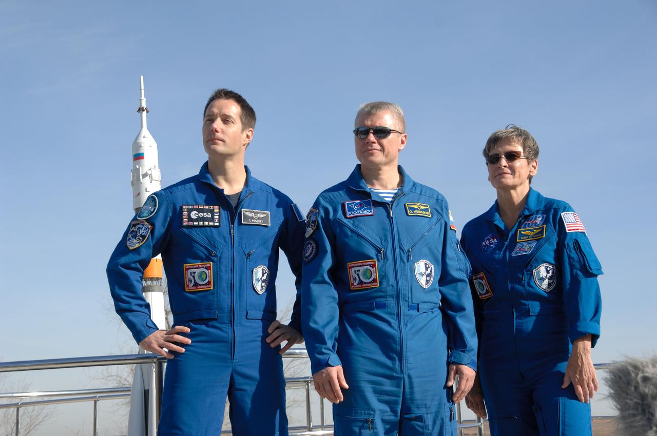 At the Cosmonaut Hotel crew quarters in Baikonur, Kazakhstan, Expedition 50-51 crewmembers Thomas Pesquet of the European Space Agency (left), Oleg Novitskiy of the Russian Federal Space Agency (Roscosmos, center) and Peggy Whitson of NASA (right) pose for pictures Nov. 10 during preflight activities. They will launch Nov. 18, Baikonur time, on the Soyuz MS-03 spacecraft for a six-month mission on the International Space Station. NASA/Alexander Vysotsky