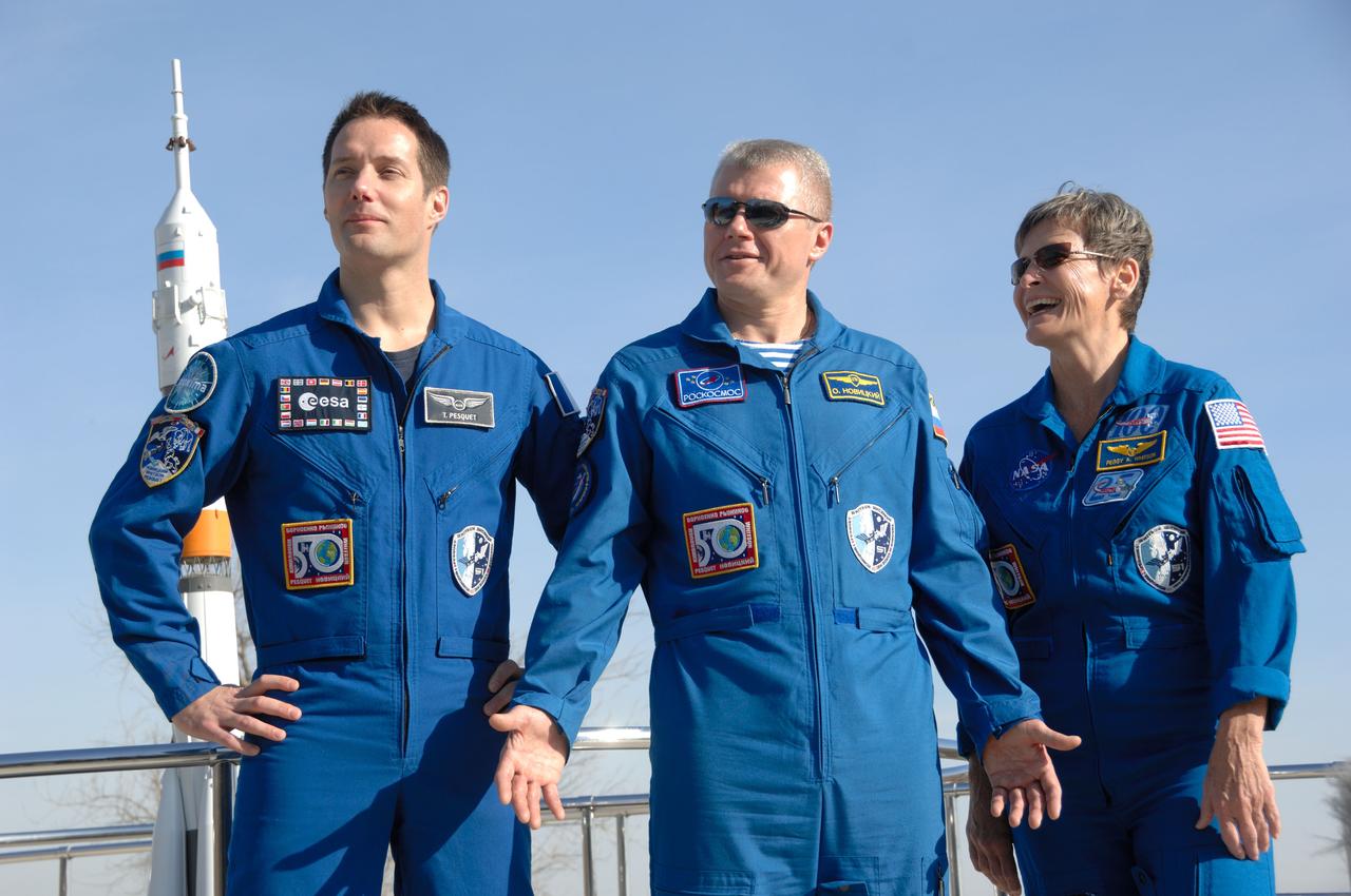 At the Cosmonaut Hotel crew quarters in Baikonur, Kazakhstan, Expedition 50-51 crewmembers Thomas Pesquet of the European Space Agency (left), Oleg Novitskiy of the Russian Federal Space Agency (Roscosmos, center) and Peggy Whitson of NASA (right) pose for pictures Nov. 10 during preflight activities. They will launch Nov. 18, Baikonur time, on the Soyuz MS-03 spacecraft for a six-month mission on the International Space Station. NASA/Alexander Vysotsky
