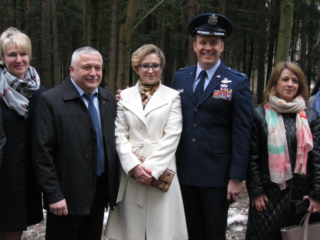 jsc2017e039771 (04/05/2017) --- At the Gagarin Cosmonaut Training Center in Star City, Russia, Expedition 51 crewmember Jack Fischer of NASA (second from the right) poses for pictures with his crewmate, Fyodor Yurchikhin of the Russian Federal Space Agency (Roscosmos, second from the left) and Yurchikhin’s wife April 5 as they prepared to fly to the launch site at the Baikonur Cosmodrome in Kazakhstan for final pre-launch preparations. Fischer and Yurchikhin will launch April 20 on the Soyuz MS-04 spacecraft from Baikonur for a four and a half month mission on the International Space Station. Photp: NASA/Rob Navias