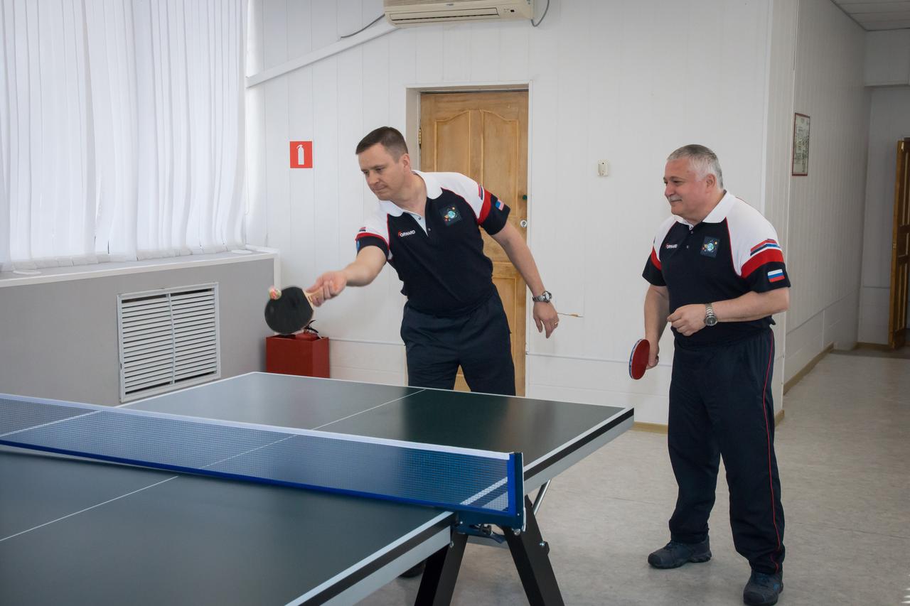 jsc2017e043072 (April 13, 2017) --- At the Cosmonaut Hotel crew quarters in Baikonur, Kazakhstan, Expedition 51 crewmembers Jack Fischer of NASA (left) and Fyodor Yurchikhin of the Russian Federal Space Agency (Roscosmos, right) get in a game of ping-pong April 13 as part of their pre-launch activities. Fischer and Yurchikhin will liftoff April 20 from the Baikonur Cosmodrome on the Soyuz MS-04 spacecraft for a four and a half month mission on the International Space Station. NASA/Victor Zelentsov