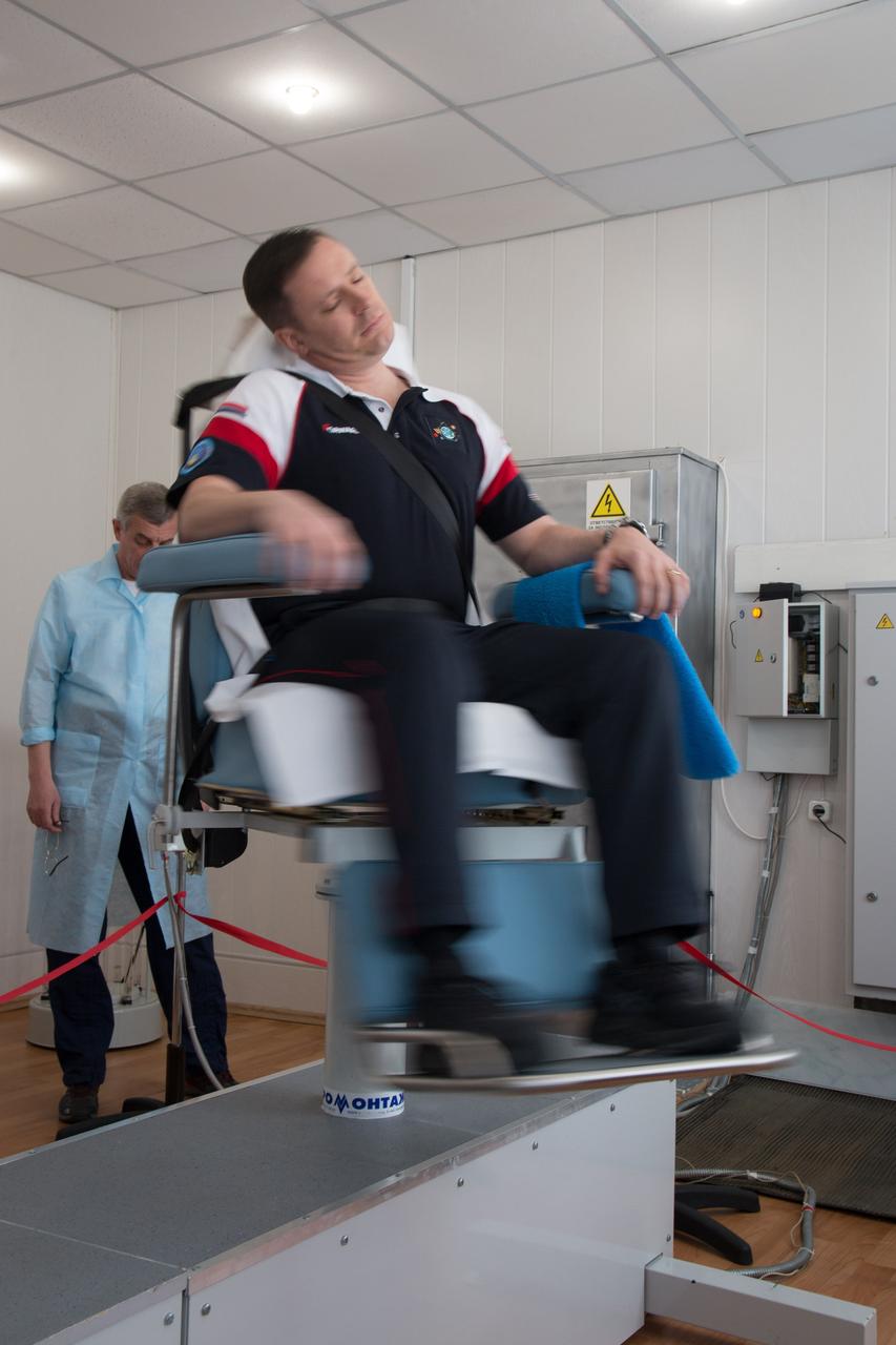 jsc2017e043073 (April 13, 2017) --- At the Cosmonaut Hotel crew quarters in Baikonur, Kazakhstan, Expedition 51 crewmember Jack Fischer of NASA takes a spin in a rotating chair to test his vestibular system April 13 as part of his pre-launch activities. Fischer and Fyodor Yurchikhin of the Russian Federal Space Agency (Roscosmos) will liftoff April 20 from the Baikonur Cosmodrome on the Soyuz MS-04 spacecraft for a four and a half month mission on the International Space Station. NASA/Victor Zelentsov