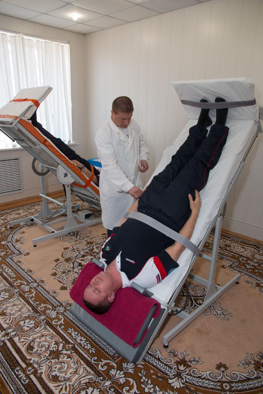 jsc2017e043074 (April 13, 2017) --- At the Cosmonaut Hotel crew quarters in Baikonur, Kazakhstan, Expedition 51 crewmember Jack Fischer of NASA conducts a session on a tilt table to test his vestibular system April 13 as part of his pre-launch activities. Fischer and Fyodor Yurchikhin of the Russian Federal Space Agency (Roscosmos) will liftoff April 20 from the Baikonur Cosmodrome on the Soyuz MS-04 spacecraft for a four and a half month mission on the International Space Station. NASA/Victor Zelentsov