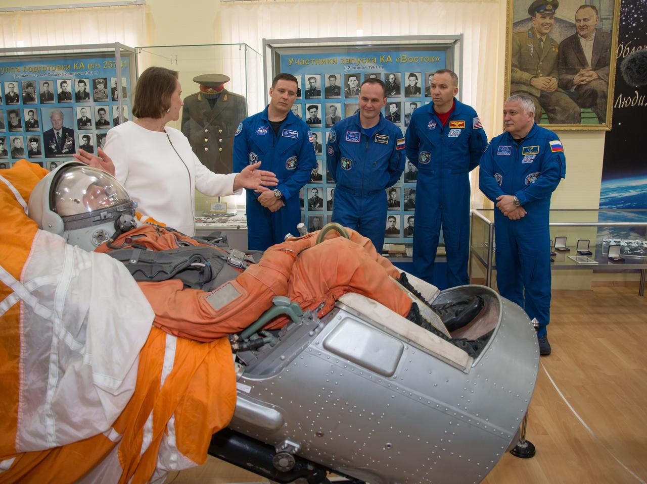 jsc2017e043851 (April 14, 2017) --- At the Baikonur Cosmodrome Museum in Kazakhstan, the Expedition 51 prime and backup crewmembers are shown a replica of a Soyuz seat and passenger April 14 during a traditional tour of the facility. From left to right are prime crewmember Jack Fischer of NASA, backup crewmember Sergey Ryazanskiy of the Russian Federal Space Agency (Roscosmos), backup crewmember Randy Bresnik of NASA and prime crewmember Fyodor Yurchikhin of Roscosmos. Fischer and Yurchikhin will launch April 20 on the Soyuz MS-04 spacecraft for a four and a half month mission on the International Space Station. Credit: NASA/Victor Zelentsov