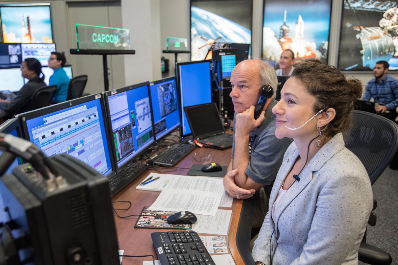 jsc2017e049159 (April 24, 2017) --- Flight Director Brian Smith, Capcom Astronaut Jessica Meir along with Astronaut Jeff Williams monitor activities in Mission Control as President Donald Trump, First Daughter Ivanka Trump and NASA astronaut Kate Rubins make a special Earth-to-space call from the Oval Office to personally congratulate NASA astronaut Peggy Whitson for her record-breaking stay aboard the International Space Station. (Photo Credit: NASA/Robert Markowitz)