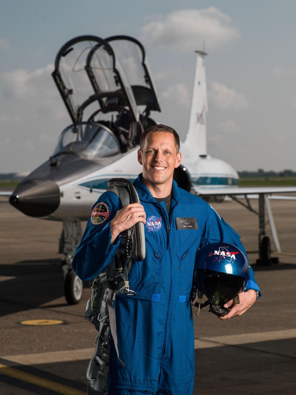 jsc2017e067123 (June 6, 2017) --- NASA portrait of 2017 Astronaut Candidate Bob Hines in front of a T-38 trainer aircraft at Ellington Field near NASA’s Johnson Space Center in Houston, Texas.