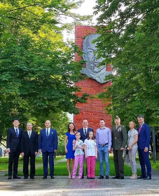 jsc2017e095970 (July 16, 2017) --- With a tree-shrouded statue of Vladimir Lenin serving as a backdrop at the Gagarin Cosmonaut Training Center in Star City, Russia, the Expedition 52-53 prime and backup crewmembers and some family members pose for pictures July 16 before the crewmembers flew to the Baikonur Cosmodrome in Kazakhstan for final pre-launch training. From left to right are backup crewmembers Norishige Kanai of the Japan Aerospace Exploration Agency (JAXA), Mark Vande Hei of NASA and Alexander Misurkin of the Russian Federal Space Agency (Roscosmos) and prime crewmembers Sergey Ryazanskiy of Roscosmos and his family, including his wife Alexandra, Randy Bresnik of NASA and Paolo Nespoli of the European Space Agency and his wife, Alexandra. Ryazanskiy, Bresnik and Nespoli will launch July 28 from Baikonur on the Soyuz MS-05 spacecraft for a five-month mission on the International Space Station. Credit: NASA/Beth Weissinger