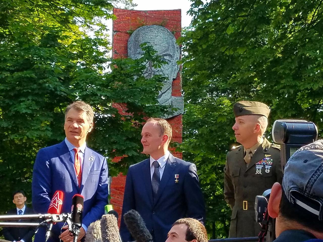 jsc2017e095972 (July 16, 2017) --- With a tree-shrouded statue of Vladimir Lenin serving as a backdrop at the Gagarin Cosmonaut Training Center in Star City, Russia, Expedition 52-53 crewmember Paolo Nespoli of the European Space Agency (left) answers a reporter’s question July 16 as his crewmates, Sergey Ryazanskiy of the Russian Federal Space Agency (Roscosmos, center) and Randy Bresnik of NASA (right) look on. The trio flew to the Baikonur Cosmodrome in Kazakhstan for final pre-launch training for their launch July 28 on the Soyuz MS-05 spacecraft and a five-month mission on the International Space Station. Credit: NASA/Beth Weissinger