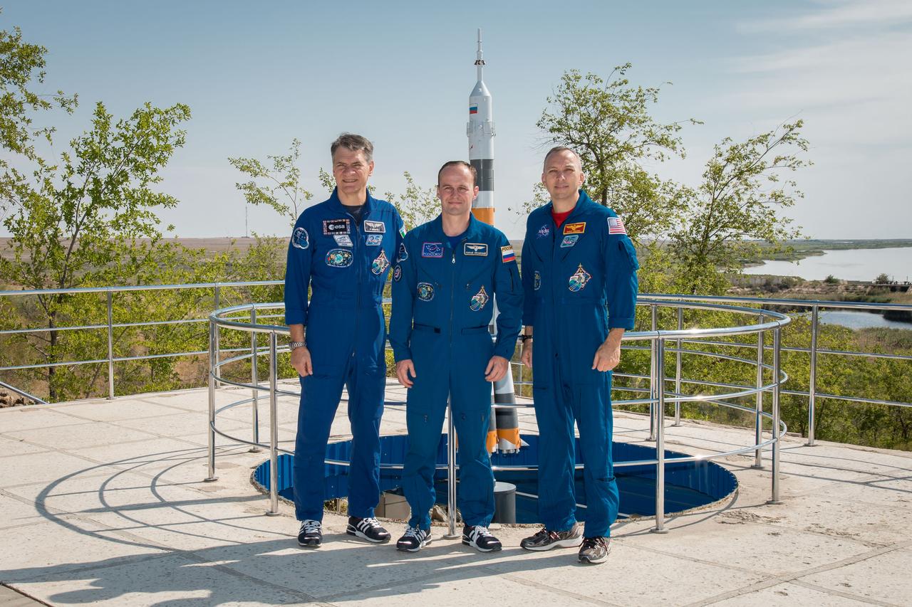 jsc2017e101936 (July 22, 2017) --- At the Cosmonaut Hotel crew quarters in Baikonur, Kazakhstan, Expedition 52-53 Flight Engineers Paolo Nespoli of the European Space Agency (left), Sergey Ryazanskiy of the Russian Federal Space Agency (Roscosmos, center) and Randy Bresnik of NASA (right) pose for pictures July 22 in the midst of pre-launch training. The trio will launch July 28 on the Soyuz MS-05 spacecraft from the Baikonur Cosmodrome for a five-month mission on the International Space Station. Credit: NASA/Victor Zelentsov