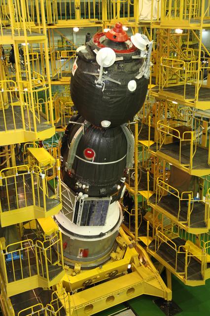 jsc2017e101954 (July 22, 2017) --- In the Integration Facility at the Baikonur Cosmodrome in Kazakhstan, the Soyuz MS-05 spacecraft is lowered to a horizontal position to be encapsulated in the upper stage of a Soyuz booster July 21 in preparation for its launch. Expedition 52-53 crewmembers Sergey Ryazanskiy of the Russian Federal Space Agency (Roscosmos), Randy Bresnik of NASA and Paolo Nespoli of the European Space Agency will launch July 28 on the Soyuz MS-05 for a five-month mission on the International Space Station. Credit: Roscosmos