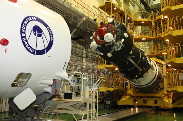 jsc2017e101955 (July 22, 2017) --- In the Integration Facility at the Baikonur Cosmodrome in Kazakhstan, the Soyuz MS-05 spacecraft is lowered to a horizontal position to be encapsulated in the upper stage of a Soyuz booster July 21 in preparation for its launch. Expedition 52-53 crewmembers Sergey Ryazanskiy of the Russian Federal Space Agency (Roscosmos), Randy Bresnik of NASA and Paolo Nespoli of the European Space Agency will launch July 28 on the Soyuz MS-05 for a five-month mission on the International Space Station. Credit: Roscosmos