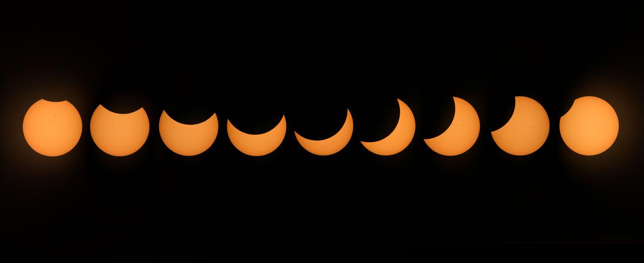 jsc2017e111180 (Aug. 21, 2017) --- Employees at NASA’s Johnson Space Center in Houston joined the rest of the country in experiencing the 2017 eclipse on Aug. 21, 2017. This composite image was made of nine separate photographs captured in the duration of the eclipse. In Houston, the partial eclipse duration was 2 hours, 59 minutes, reaching its maximum level of 70 percent at 1:16 p.m. CDT.