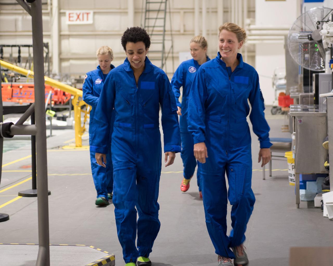 jsc2017e111693 (08-23-2017) --- (From left, foreground) 2017 NASA astronaut candidates Jessica Watkins, Loral O’Hara, (from left, background) Zena Cardman and Canadian Space Agency astronaut candidate Jennifer Sidey-Gibbons during water survival training at NASA Johnson Space Center’s Neutral Buoyancy Laboratory in Houston. (NASA/David DeHoyos)