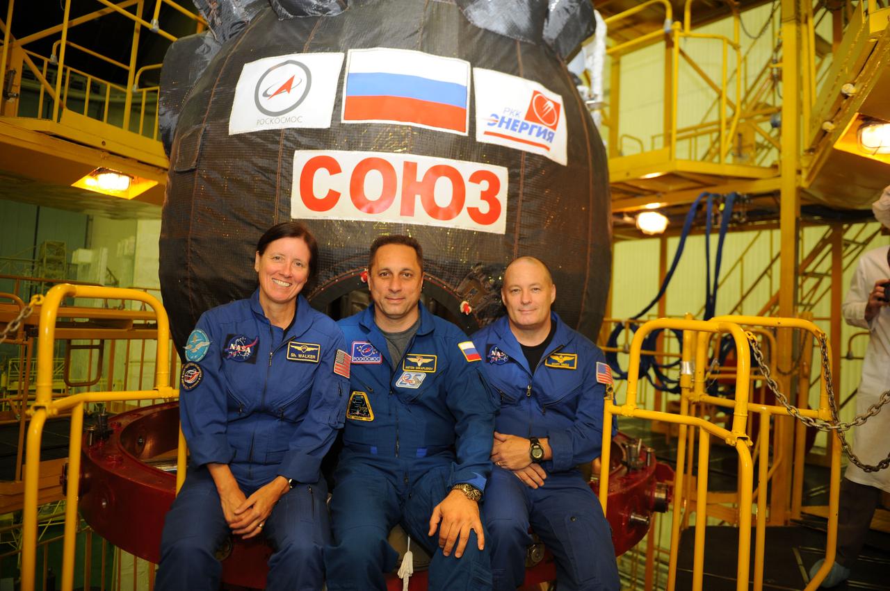 jsc2017e114471 (Aug. 28, 2017) --- At the Baikonur Cosmodrome in Kazakhstan, the Expedition 53-54 backup crewmembers pose for pictures in from of the Soyuz MS-06 spacecraft during pre-launch training activities Aug. 28. Shannon Walker of NASA (left), Anton Shkaplerov of Roscosmos (center) and Scott tingle of NASA (right) are serving as backups to the prime crewmembers, Joe Acaba and Mark Vande Hei of NASA and Alexander Misurkin of Roscosmos, who will launch Sept. 13 on the Soyuz MS-06 for a five and a half month mission on the International Space Station. Credit: Gagarin Cosmonaut Training Center/Irina Peshkova
