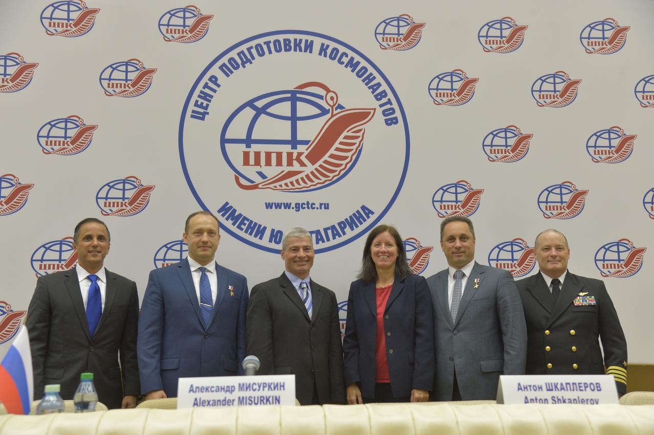 jsc2017e114483 (Sept. 1, 2017) --- At the Gagarin Cosmonaut Training Center in Star City, Russia, the Expedition 53-54 prime and backup crewmembers pose for pictures following a news conference Sept. 1. From left to right are the prime crewmembers, Joe Acaba of NASA, Alexander Misurkin of Roscosmos and Mark Vande Hei of NASA, and the backup crewmembers, Shannon Walker of NASA, Anton Shkaplerov of Roscosmos and Scott Tingle of NASA. Acaba, Misurkin and Vande Hei will launch Sept. 13 on the Soyuz MS-06 spacecraft from the Baikonur Cosmodrome in Kazakhstan on a five and a half month mission aboard the International Space Station. Credit: NASA/Elizabeth Weissinger