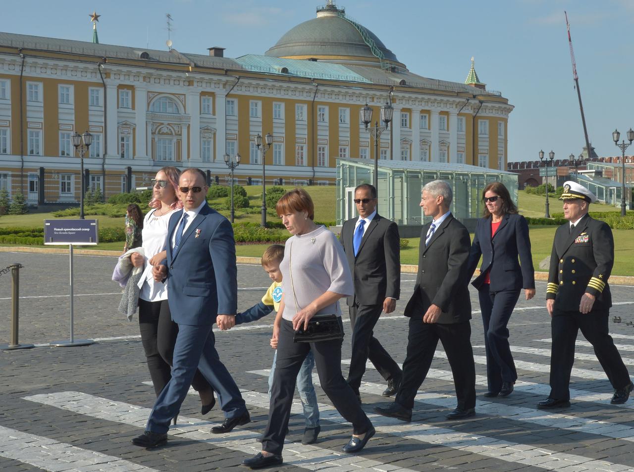 jsc2017e114489 (Sept. 1, 2017) --- Expedition 53-54 prime crewmember Alexander Misurkin of Roscosmos walks through the ground of the Kremlin in Moscow with his family Sept. 1 as part of traditional pre-launch ceremonies. Following Misurkin are NASA astronauts Joe Acaba, Mark Vande Hei, Shannon Walker and Scott Tingle. Misurkin, Acaba and Vande Hei will launch Sept. 13 from the Baikonur Cosmodrome in Kazakhstan Sept. 13 on the Soyuz MS-06 spacecraft for a five and a half month mission on the International Space Station. Credit: NASA/Elizabeth Weissinger