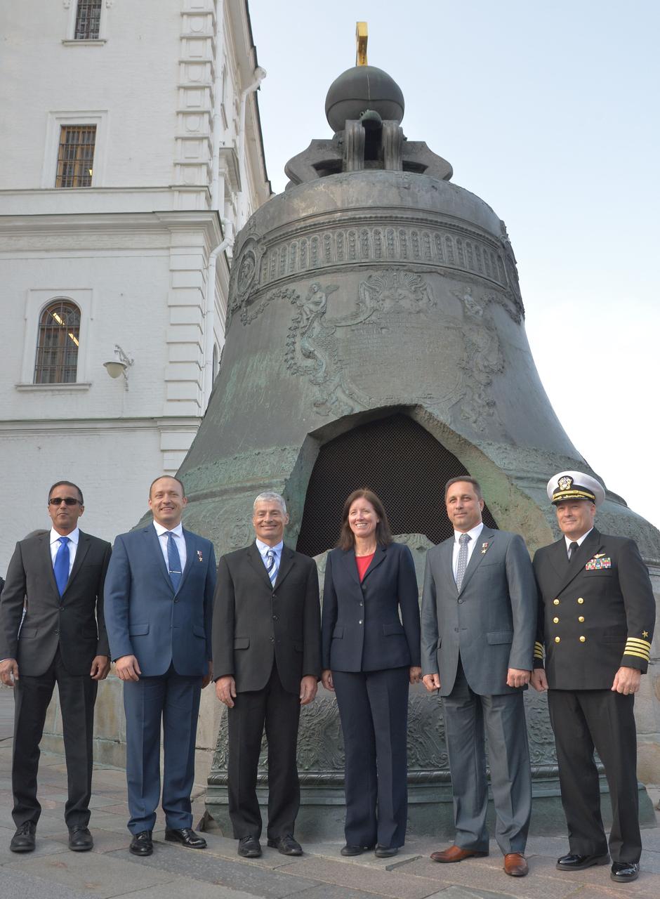 jsc2017e114490 (Sept. 1, 2017) --- The Expedition 53-54 prime and backup crewmembers pose for pictures in front of the Tsar Bell at the Kremlin in Moscow Sept. 1 as part of their traditional pre-launch visit. From left to right are prime crewmembers Joe Acaba of NASA, Alexander Misurkin of Roscosmos and Mark Vande Hei of NASA and backup crewmembers Shannon Walker of NASA, Anton Shkaplerov of Roscosmos and Scott Tingle of NASA. Misurkin, Acaba and Vande Hei will launch Sept. 13 from the Baikonur Cosmodrome in Kazakhstan Sept. 13 on the Soyuz MS-06 spacecraft for a five and a half month mission on the International Space Station. Credit: NASA/Elizabeth Weissinger