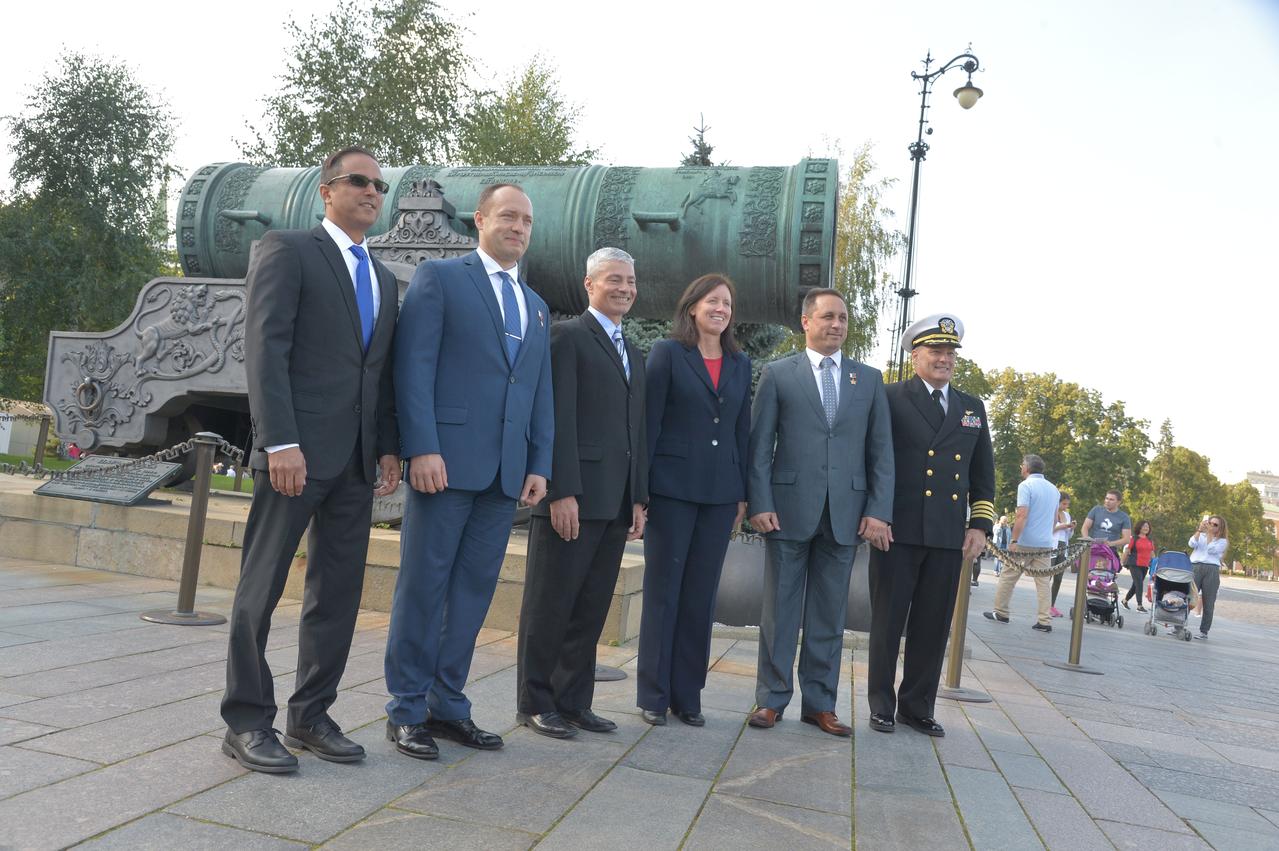 jsc2017e114491 (Sept. 1, 2017) --- The Expedition 53-54 prime and backup crewmembers pose for pictures in front of the Tsar Cannon at the Kremlin in Moscow Sept. 1 as part of their traditional pre-launch visit. From left to right are prime crewmembers Joe Acaba of NASA, Alexander Misurkin of Roscosmos and Mark Vande Hei of NASA and backup crewmembers Shannon Walker of NASA, Anton Shkaplerov of Roscosmos and Scott Tingle of NASA. Misurkin, Acaba and Vande Hei will launch Sept. 13 from the Baikonur Cosmodrome in Kazakhstan Sept. 13 on the Soyuz MS-06 spacecraft for a five and a half month mission on the International Space Station. Credit: NASA/Elizabeth Weissinger