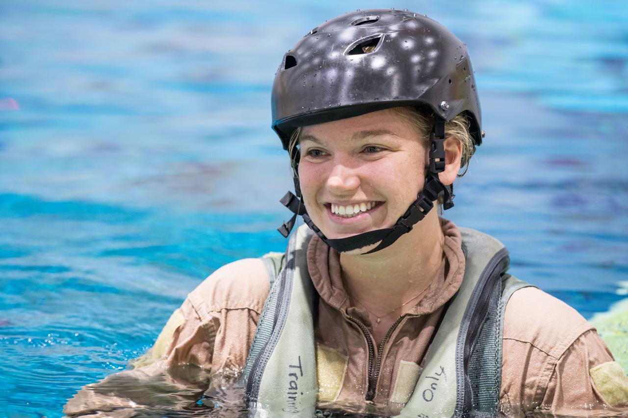 jsc2017e118963 (September 21, 2017) --- 2017 Canadian Space Agency astronaut candidate Jennifer Sidey-Gibbons is all smiles during helicopter water survival training at NASA Johnson Space Center’s Neutral Buoyancy Laboratory in Houston. Photo Credit: (NASA/Josh Valcarcel)