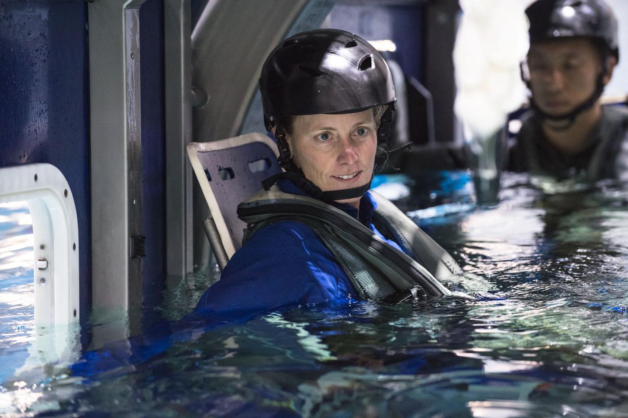 jsc2017e118966 (September 21, 2017) --- 2017 NASA astronaut candidate Loral O’Hara readies for helicopter water survival training at NASA Johnson Space Center’s Neutral Buoyancy Laboratory in Houston. Photo Credit: (NASA/Josh Valcarcel)