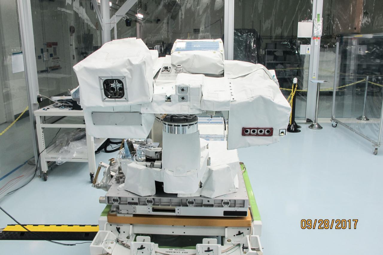 jsc2017e119288 (Sep. 28, 2017) --- Total and Spectral Solar Irradiance Sensor (TSIS) Thermal Pointing System (TPS) in its deployed configuration during spacewalk tool fit-checks and sharp edge inspection at NASA's Johnson Space Center. TSIS examines how Earth's atmosphere responds to solar ouput changes.