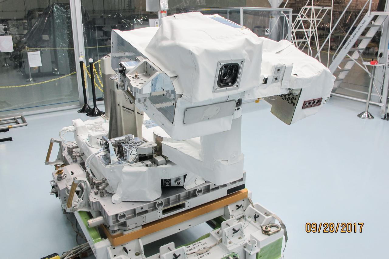 jsc2017e119290 (Sep. 28, 2017) --- Total and Spectral Solar Irradiance Sensor (TSIS) Thermal Pointing System (TPS) in its deployed configuration during spacewalk tool fit-checks and sharp edge inspection at NASA's Johnson Space Center. TSIS examines how Earth's atmosphere responds to solar ouput changes.