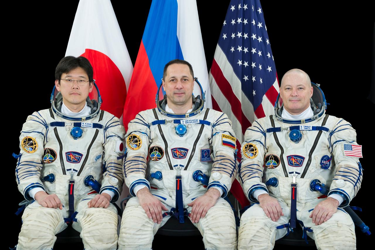 jsc2017e129521 (April 7, 2017) --- Expedition 54-55 prime crew members (from left) Norishige Kanai of the Japan Aerospace Exploration Agency, Anton Shkaplerov of Roscosmos and Scott Tingle of NASA.
