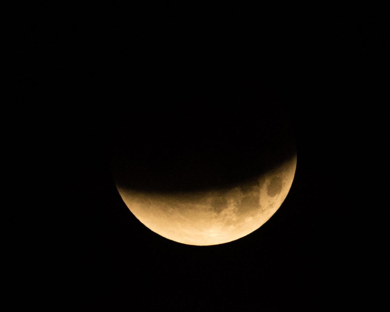 jsc2018e003251 (Jan. 31, 2018) --- The lunar eclipse "Blood Moon" was photographed from the Johnson Space Center in Houston, Texas, during the early morning hours of Jan. 31, 2018. Credit: NASA/Robert Markowitz