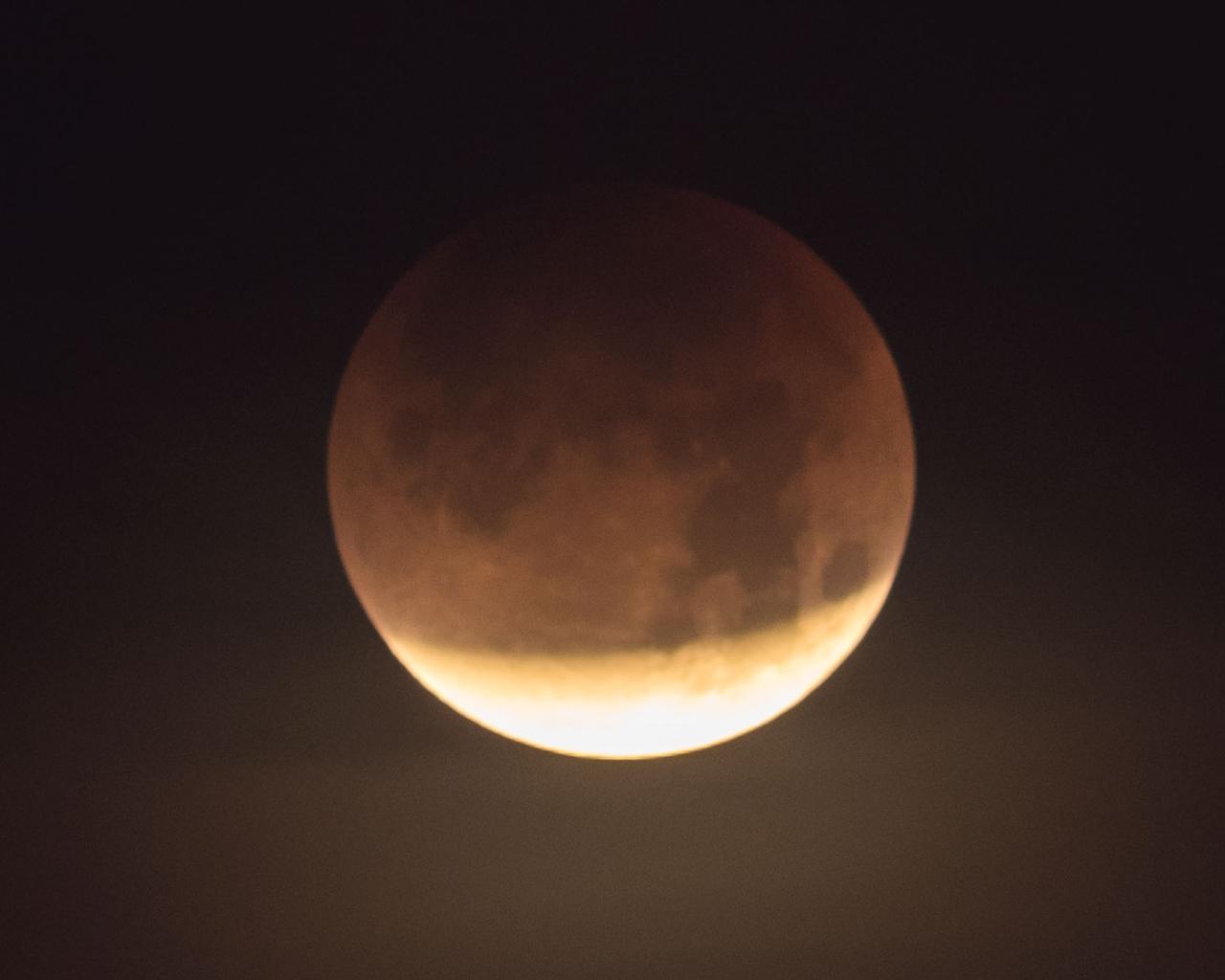 jsc2018e003252 (Jan. 31, 2018) --- The lunar eclipse "Blood Moon" was photographed from the Johnson Space Center in Houston, Texas, during the early morning hours of Jan. 31, 2018. Credit: NASA/Robert Markowitz