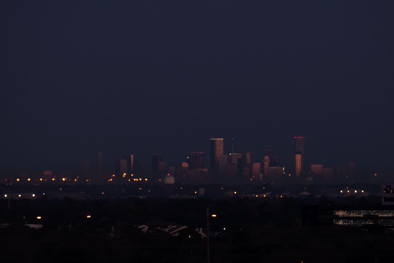 jsc2018e003253 (Jan. 31, 2018) ---  Downtown Houston, Texas was photographed from the Johnson Space Center during an early sunrise on Jan. 31, 2018. Credit: NASA/Robert Markowitz
