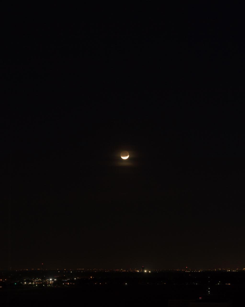 jsc2018e003259 (Jan. 31, 2018) --- The lunar eclipse "Blood Moon" was photographed from the Johnson Space Center in Houston, Texas, during the early morning hours of Jan. 31, 2018. Credit: NASA/ Norah Moran
