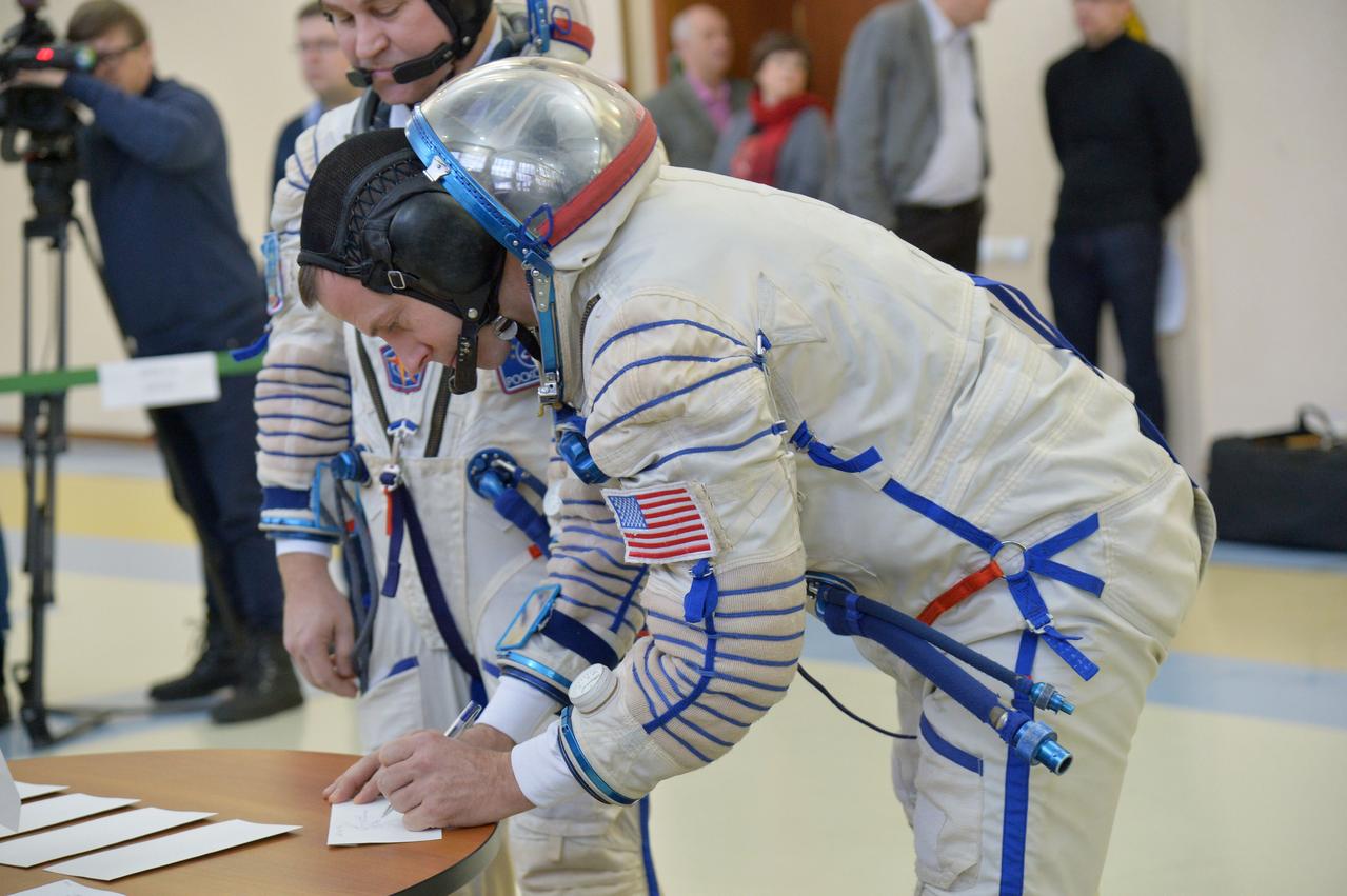 At the Gagarin Cosmonaut Training Center in Star City, Russia, Expedition 55 backup crewmember Nick Hague of NASA signs in for qualification exams Feb. 20. Hague and Alexey Ovchinin of Roscosmos are serving as backups to the prime crew, Oleg Artemyev of Roscosmos and Ricky Arnold and Drew Feustel of NASA, who will launch March 21 on the Soyuz MS-08 spacecraft from the Baikonur Cosmodrome in Kazakhstan for a five month mission on the International Space Station.  NASA/Elizabeth Weissinger