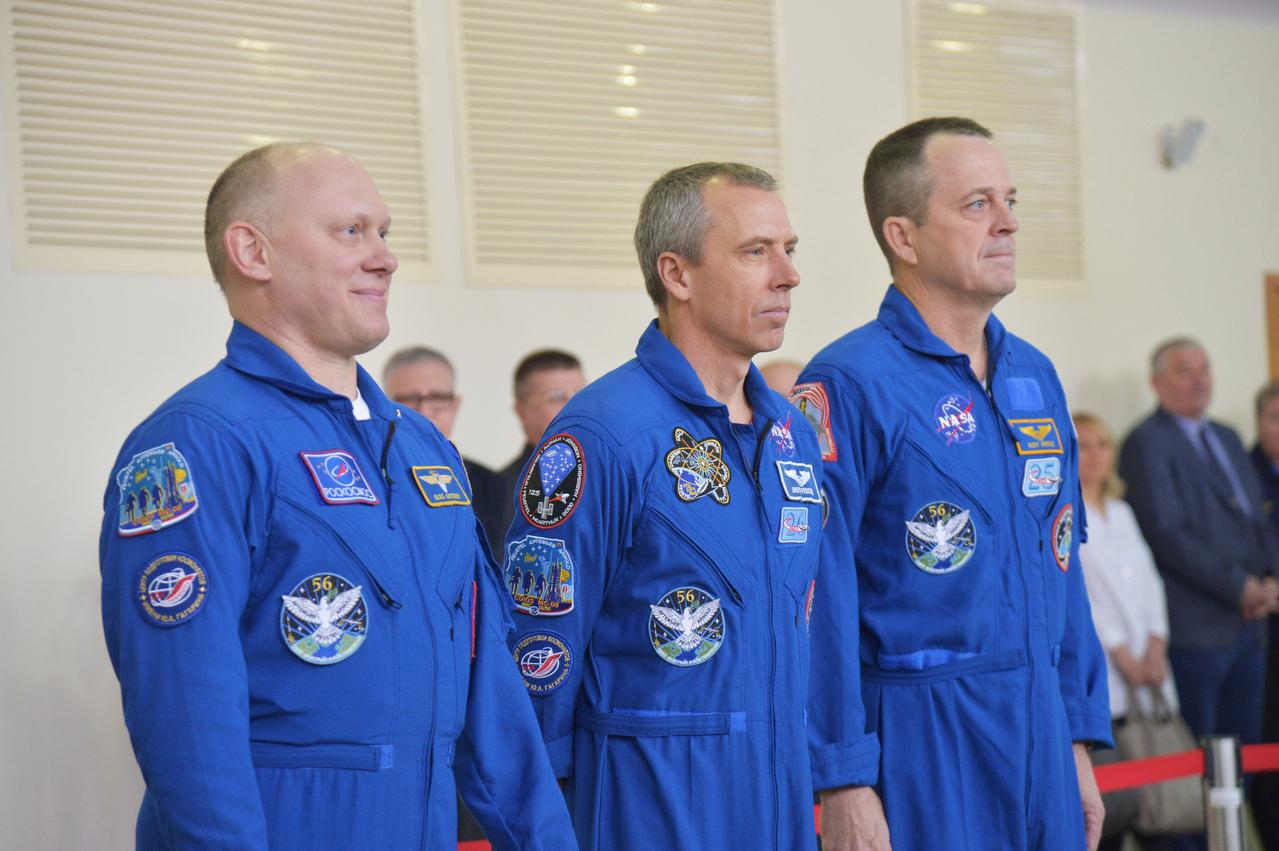 At the Gagarin Cosmonaut Training Center in Star City, Russia, Expedition 55 prime crewmembers Oleg Artemyev of Roscosmos (left) and Drew Feustel and Ricky Arnold of NASA (center and right) report for a day of qualification exams Feb. 20. They will launch March 21 on the Soyuz MS-08 spacecraft from the Baikonur Cosmodrome in Kazakhstan for a five month mission on the International Space Station.  NASA/Elizabeth Weissinger