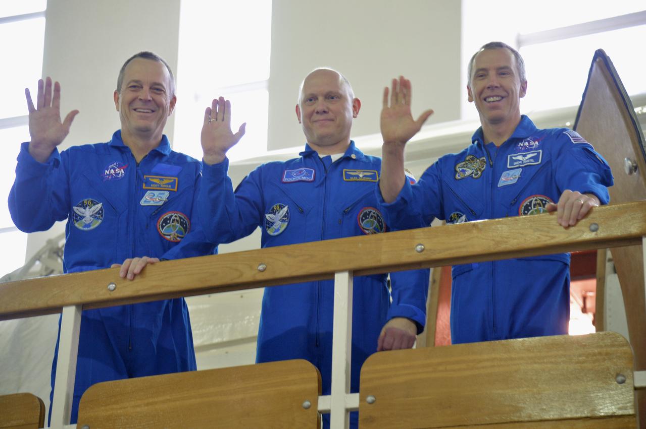 At the Gagarin Cosmonaut Training Center in Star City, Russia, Expedition 55 prime crewmembers Ricky Arnold and Drew Feustel of NASA (left and center) and Oleg Artemyev of Roscosmos (right) pose for pictures during a day of qualification exams Feb. 20. They will launch March 21 on the Soyuz MS-08 spacecraft from the Baikonur Cosmodrome in Kazakhstan for a five month mission on the International Space Station.  NASA/Elizabeth Weissinger