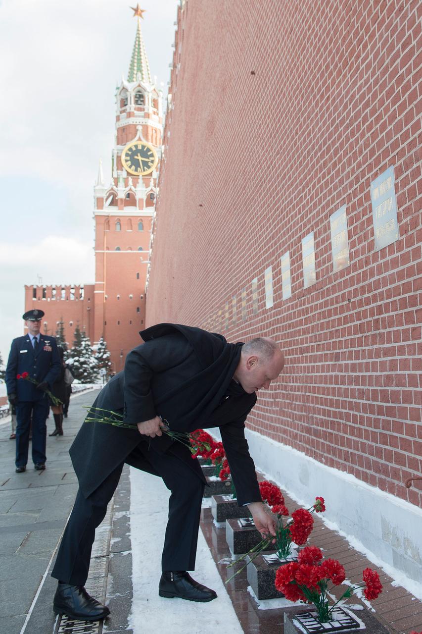 jsc2018e008062 - At Red Square in Moscow, Expedition 55 crewmember Oleg Artemyev lays flowers at the Kremlin Wall where Russian space icons are interred in traditional pre-launch activities Feb. 22. Artemyev, Drew Feustel of NASA and Ricky Arnold of NASA will launch March 21 on the Soyuz MS-08 spacecraft from the Baikonur Cosmodrome in Kazakhstan for a five-month mission on the International Space Station...Gagarin Cosmonaut Training Center/Andrey Shelepin and Irina Spektor                         .