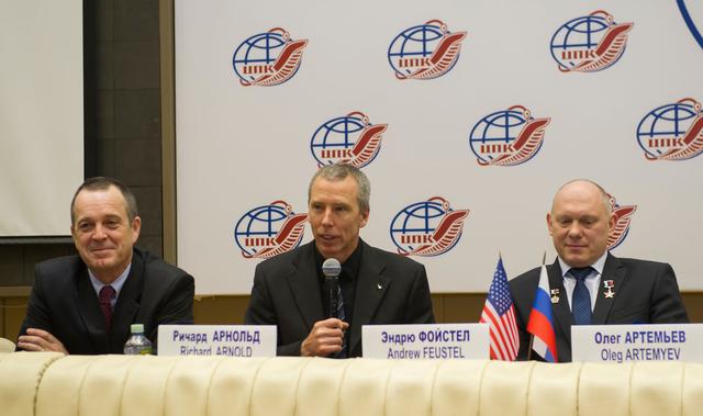 jsc2018e008075 - At the Gagarin Cosmonaut Training Center in Star City, Russia, Expedition 55 crewmember Drew Feustel of NASA (center) answers a reporter’s question during a news conference Feb. 22. Looking on are crewmates Ricky Arnold of NASA (left) and Oleg Artemyev of Roscosmos (right). They will launch March 21 on the Soyuz MS-08 spacecraft from the Baikonur Cosmodrome in Kazakhstan for a five-month mission on the International Space Station...Gagarin Cosmonaut Training Center/Andrey Shelepin and Irina Spektor .