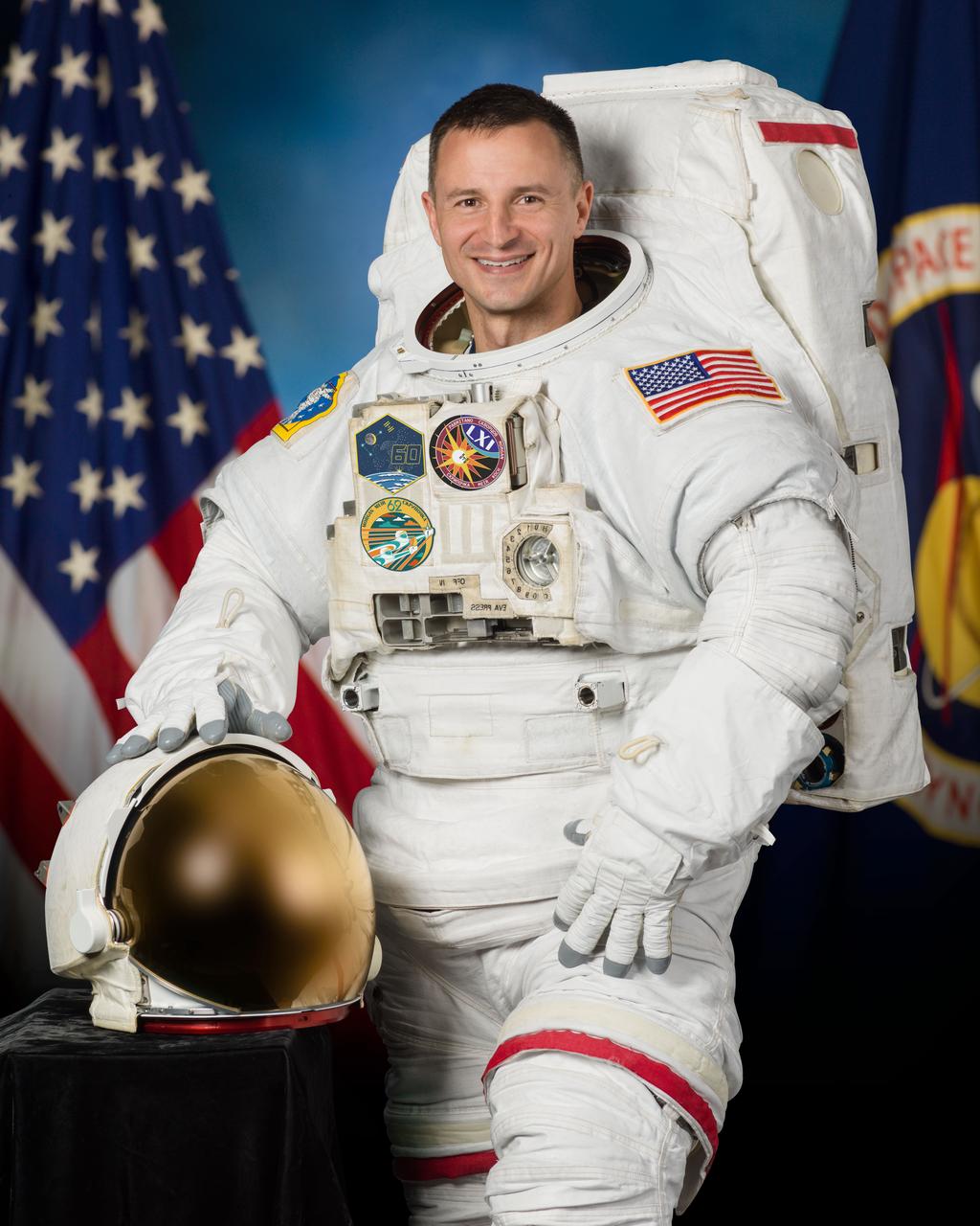 jsc2018e026642_alt (April 30, 2019) --- Official portrait of NASA astronaut Andrew Morgan in a U.S. spacesuit, also known as an Extravehicular Mobility Unit (EMU).